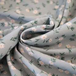 tissu jersey vert de gris motif fleuri